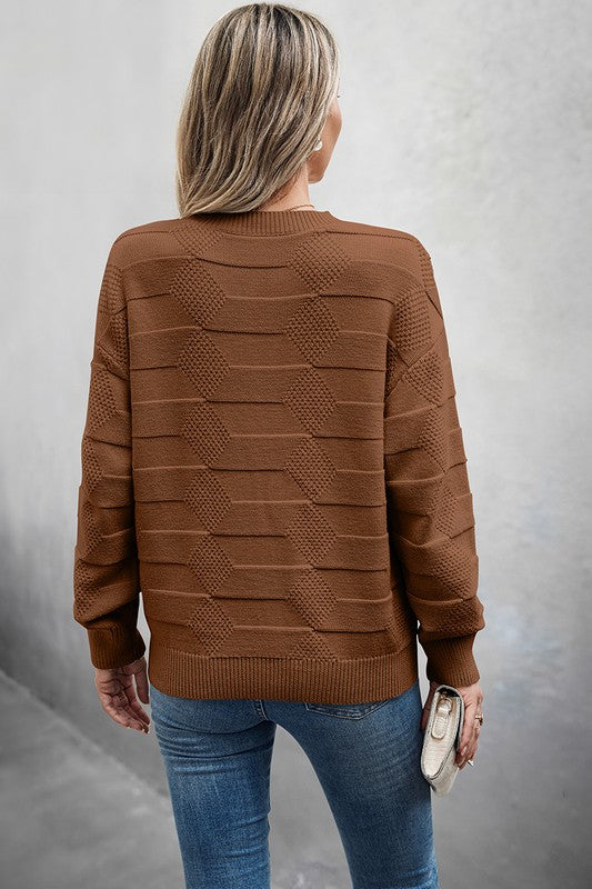 Classic Round Neck Loose Knit Sweater in brown, showcasing textured design and relaxed fit from the back.