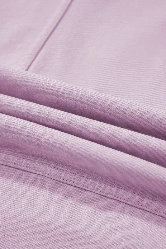 Mineral Wash Reverse Seam Drawstring Elastic Waist fabric detail, showcasing soft and stylish textures in light purple.
