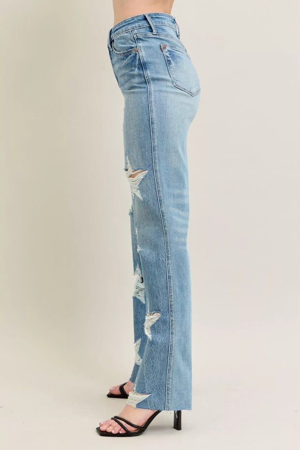 Side view of Judy Blue Plus Size High Waist Magic Star Destroy 90’s Straight Jeans with distressed star details.