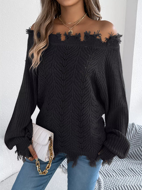 Distressed Hem Openwork Off-Shoulder Sweater – Relaxed Knit in black worn with casual jeans.