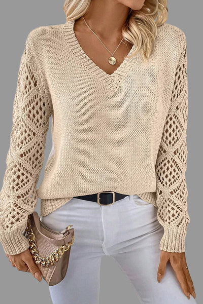 V-Neck Crochet Sleeve Sweater featuring a delicate knit design and elegant crochet sleeves, perfect for transitioning between seasons.