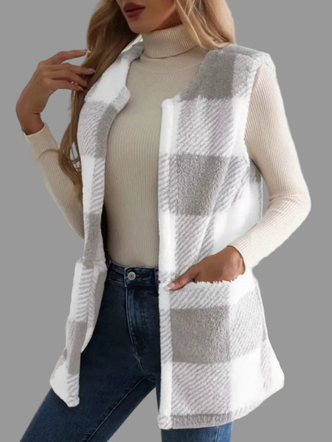 Plaid Sherpa Vest Coat worn with a turtleneck, featuring a stylish plaid design and relaxed fit.