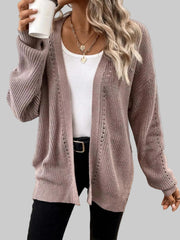 Woman in a soft pink Supreme Comfort Open-Front Cardigan holding a coffee cup and wearing a casual outfit.