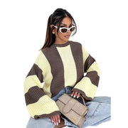 Cozy Color Block Oversized Sweater styled with sunglasses and a handbag, featuring a relaxed fit and unique color block design.