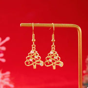 18K Gold Christmas Tree Earrings featuring shimmering rhinestones, perfect for festive holiday glam.
