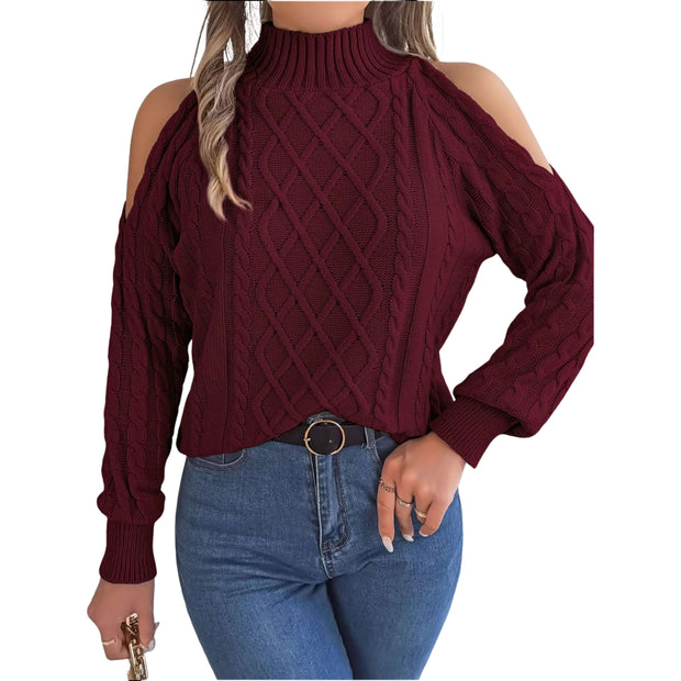 Close-up of a model wearing a Cable Knit Cold Shoulder Turtleneck Sweater in burgundy with trendy cutouts.