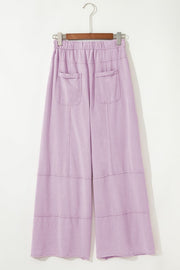 Mineral Wash Reverse Seam Drawstring Elastic Waist cargo pants in light lavender with functional pockets.