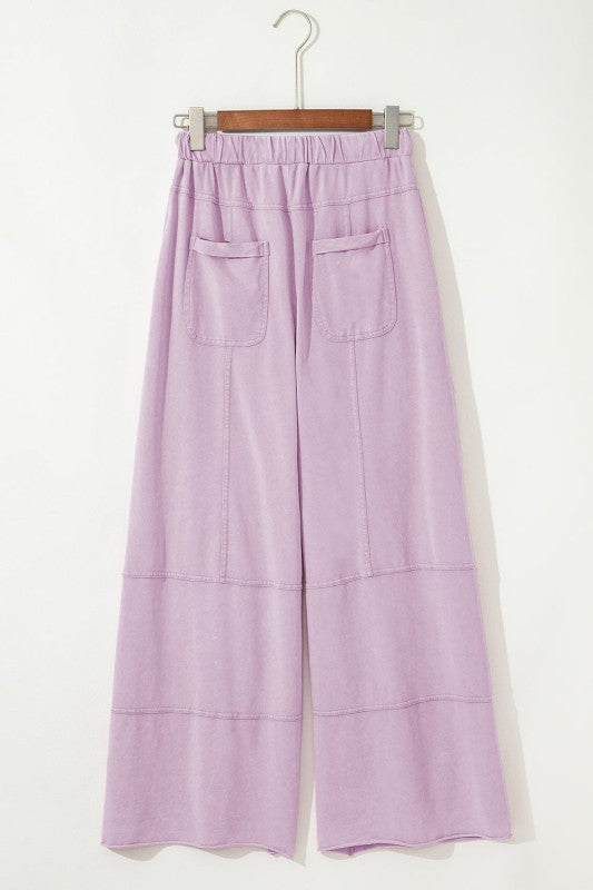 Mineral Wash Reverse Seam Drawstring Elastic Waist cargo pants in light lavender with functional pockets.