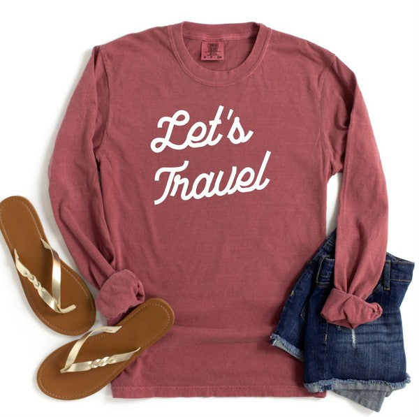 Let's Travel Comfort Color LS Tee with brown sandals and denim shorts, showcasing a casual travel-themed outfit.