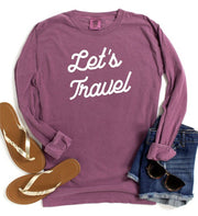Let's Travel Comfort Color LS Tee styled with flip flops and shorts on a flat lay background.