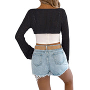 Openwork One-Shoulder Cutout Long Sleeve Sweater – Chic Knit Pullover Top styled with denim shorts from the back