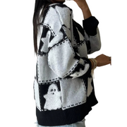 Halloween Ghost Checkered Drop-Shoulder Sweater shown in black and white with ghost pattern, perfect for autumn layering.