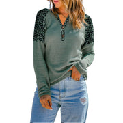 Joanna Leopard Print Waffle Knit Buttoned V-Neck Top worn by a model, featuring textured waffle knit and full-length sleeves.