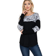 Woman wearing a Camouflage Contrast Lightweight Sweater Knit with a relaxed fit and drop shoulder design.