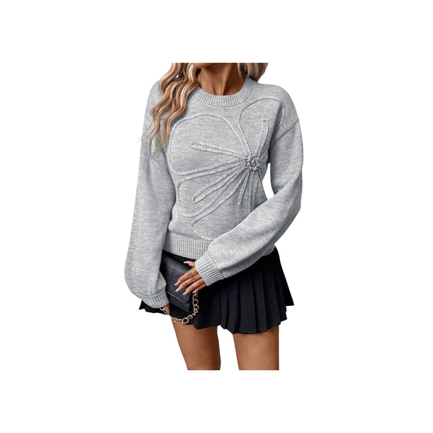 Embroidered Flower Bow Sweater with Rhinestone Detail – Round Neck Long Sleeve worn with a black pleated skirt.