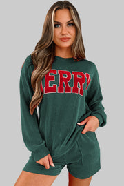 Evergreen MERRY Corded Lounge Set featuring a model in a green long-sleeve top and relaxed-fit shorts.