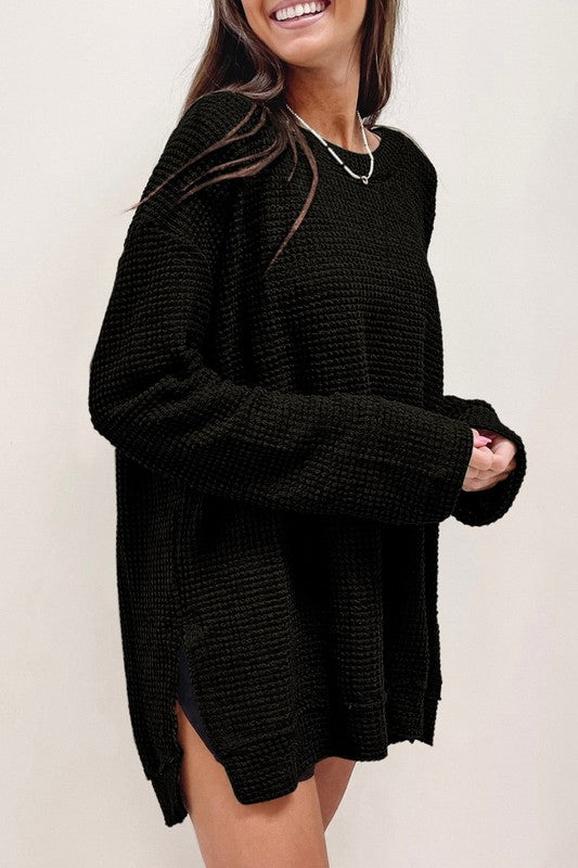 Waffle Knit Drop-Sleeve Side-Slit Oversized Top in black with relaxed fit and side slits for comfort.