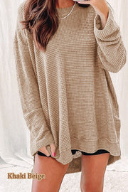 Waffle Knit Drop-Sleeve Side-Slit Oversized Top in Khaki Beige, showcasing its cozy texture and relaxed fit.