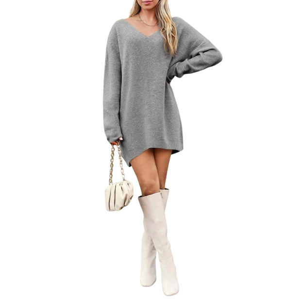 V-Neck Dropped Shoulder Sweater Dress – Cozy Knit Style worn with knee-high boots and a handbag.