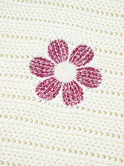 Boho Floral Cotton-Blend Eyelet Knit Sweater with floral eyelet design in a cream background.