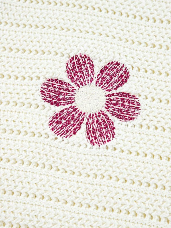 Boho Floral Cotton-Blend Eyelet Knit Sweater with floral eyelet design in a cream background.