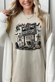 Bookstore Skeleton Halloween Graphic Heavy Cotton Tee featuring a fun skeleton design with bookstore elements for Halloween.