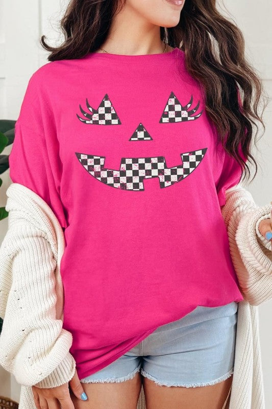 Checker Pumpkin Face Graphic Heavy Cotton Tee in bright pink with a playful pumpkin face design.