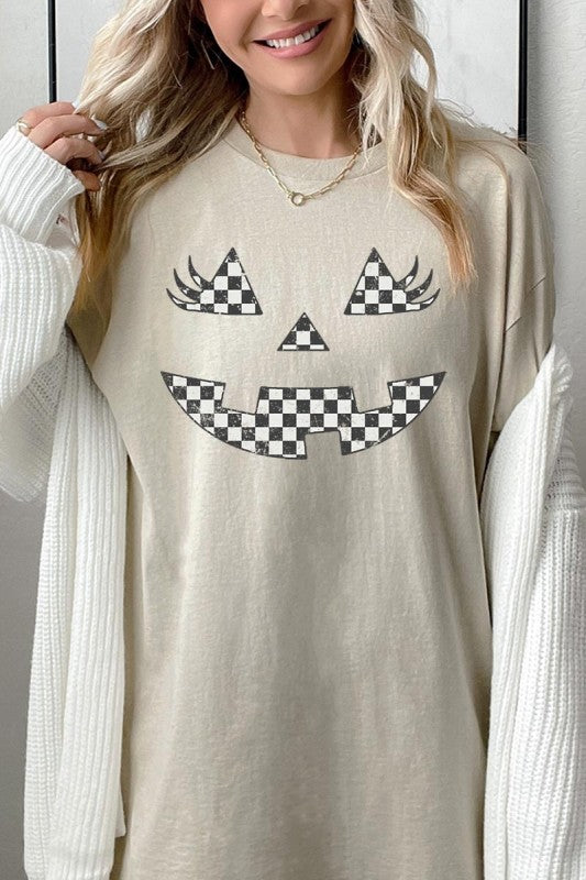 Checker Pumpkin Face Graphic Heavy Cotton Tee featuring a playful pumpkin face design in black and white.