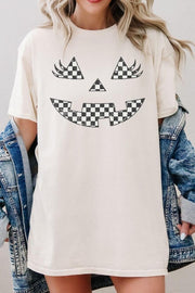 Checker Pumpkin Face Graphic Heavy Cotton Tee displayed on a model, featuring playful checker pattern in pumpkin face design.