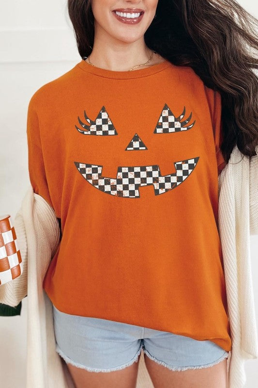 Checker Pumpkin Face Graphic Heavy Cotton Tee featuring a playful pumpkin face design for a cute Halloween look.