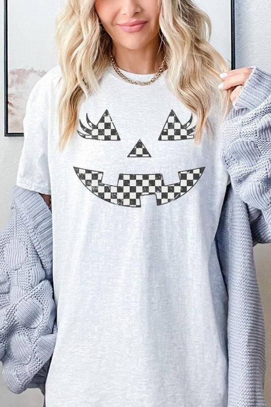Checker Pumpkin Face Graphic Heavy Cotton Tee featuring a playful pumpkin face design on a light gray background.