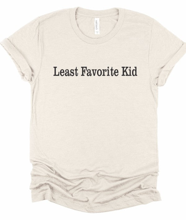 Least Favorite Kid Short Sleeve Graphic Tee in soft beige fabric with bold text.