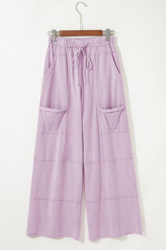 Mineral Wash Reverse Seam Drawstring Elastic Waist cargo pants in lavender with functional pockets.