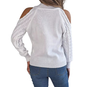 Back view of Cable Knit Cold Shoulder Turtleneck Sweater showcasing cold-shoulder cutouts and cable-knit texture.