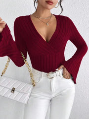 Ribbed Flare Sleeve Top in burgundy, showcasing stylish ribbed texture and flared sleeves, paired with white jeans.