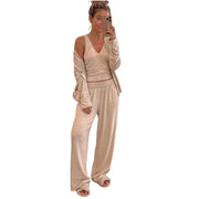 Three-Piece V-Neck Tank, Open Front Cardigan & Pants Lounge Set in beige on a model.