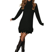 Cozy Fringe Turtleneck Sweater Dress – Long Sleeve Knit in black with fringe hem and long sleeves.