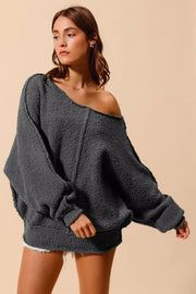 So Me Slouchy Bouclé Sweater in dark gray, featuring a relaxed, off-shoulder design and soft, cozy texture.