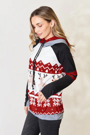 Double Take Christmas Hoodie featuring festive reindeer patterns and cozy design, perfect for holiday gatherings.