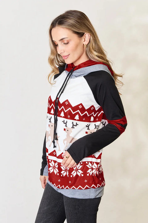 Double Take Christmas Hoodie featuring festive reindeer patterns and cozy design, perfect for holiday gatherings.