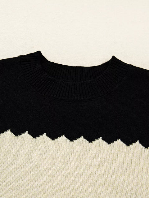 Close-up of a Color Block Drop Shoulder Sweater – Crew Neck Knit, featuring a black crew neck and zigzag pattern.