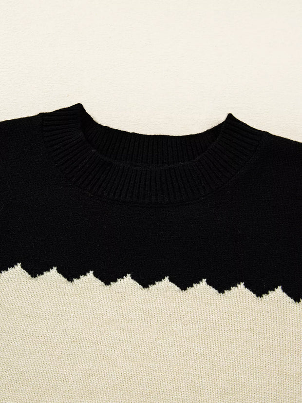 Close-up of a Color Block Drop Shoulder Sweater – Crew Neck Knit, featuring a black crew neck and zigzag pattern.