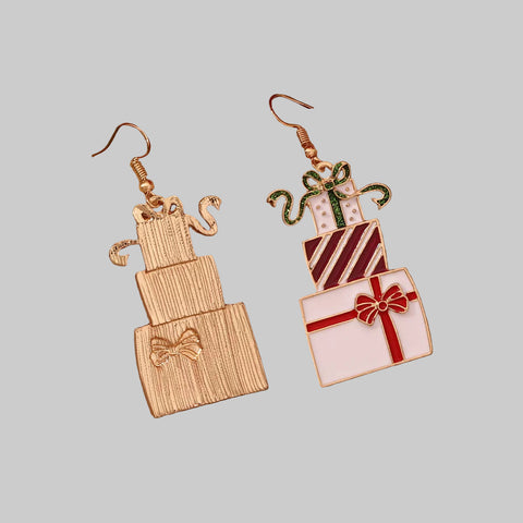 Stacked Gift Box Christmas Earrings featuring colorful stacked present charms with bows and glitter accents.
