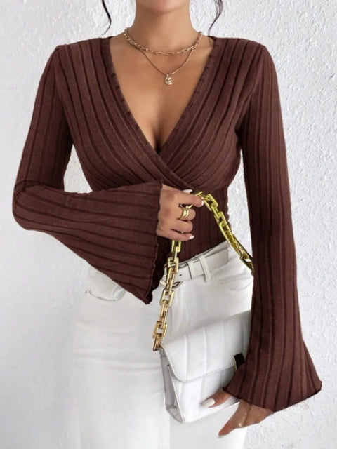 Ribbed Flare Sleeve Top – Slim Fit Knit in brown with flared sleeves and slim fit, styled with a white handbag.