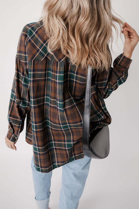 Back view of brown plaid button-up shacket showing long sleeves and soft flannel texture