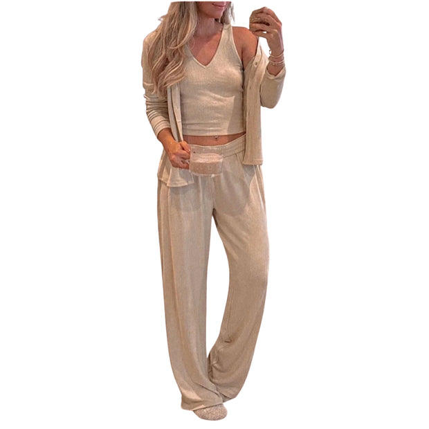 Three-Piece V-Neck Tank, Open Front Cardigan & Pants Lounge Set worn by a woman in a cozy outfit.