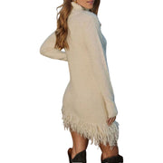 Cozy Fringe Turtleneck Sweater Dress – Long Sleeve Knit in cream color with fringe hem and turtleneck design.