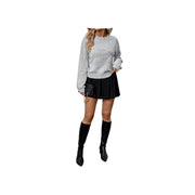 Embroidered Flower Bow Sweater with Rhinestone Detail – Round Neck Long Sleeve paired with a black pleated skirt.