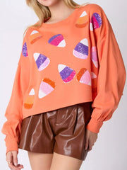 Halloween Candy Sequin Long-Sleeve Sweatshirt featuring colorful sequin candy design for festive autumn style.
