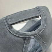 Close-up of the back strap detail of a grey view of the Star Embroidered Baseball Cap showcasing soft cotton material and stitching details.